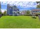 Large backyard with green grass and fencing with a view of the home at 1251 Weather Helm Dr, Mount Pleasant, SC 29466