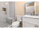 Bathroom with white vanity and a glass enclosed shower with a built in bench at 1251 Weather Helm Dr, Mount Pleasant, SC 29466