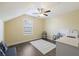 Bonus room with dark wood floors, ceiling fan and an area for a wet bar at 1251 Weather Helm Dr, Mount Pleasant, SC 29466
