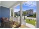Inviting front porch with comfortable seating and a view of the charming neighborhood at 1251 Weather Helm Dr, Mount Pleasant, SC 29466