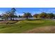 Scenic view of the golf course with lush green fairways and a tranquil lake at 1251 Weather Helm Dr, Mount Pleasant, SC 29466