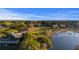 Scenic aerial view of the golf course, clubhouse, and surrounding waterfront at 1251 Weather Helm Dr, Mount Pleasant, SC 29466