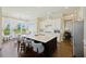 Elegant kitchen with a large island, white cabinets, and stainless steel appliances at 1251 Weather Helm Dr, Mount Pleasant, SC 29466