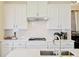 Bright kitchen featuring white subway tile backsplash and modern stainless steel appliances at 1251 Weather Helm Dr, Mount Pleasant, SC 29466