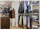 Organized walk-in closet featuring shelves and hanging rods for efficient storage of clothes and accessories at 1251 Weather Helm Dr, Mount Pleasant, SC 29466