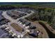 Wide aerial shot of a neighborhood showing a variety of well maintained houses at 126 Citrea Dr, Summerville, SC 29483
