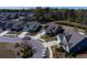 Aerial image highlighting the property in a community with well-maintained lawns and mature trees at 126 Citrea Dr, Summerville, SC 29483