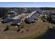 Overhead shot of a neighborhood featuring diverse homes with tree-lined streets at 126 Citrea Dr, Summerville, SC 29483