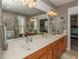 Bathroom with double sinks, a large mirror and tiled shower at 126 Citrea Dr, Summerville, SC 29483