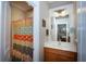 Small bathroom featuring single sink vanity and patterned shower curtain at 126 Citrea Dr, Summerville, SC 29483