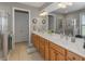 Bathroom featuring double sinks, a large mirror and tiled floors at 126 Citrea Dr, Summerville, SC 29483