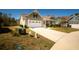 Charming home with a well-kept lawn and inviting curb appeal with an attached two-car garage at 126 Citrea Dr, Summerville, SC 29483