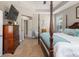 Spacious main bedroom with four-poster bed, tray ceiling, and a connected sitting area at 126 Citrea Dr, Summerville, SC 29483