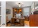 Elegant office space with custom shelving, hardwood floors, and professional decor at 126 Citrea Dr, Summerville, SC 29483