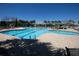 Inviting community swimming pool with lounge chairs, umbrellas, and a clubhouse at 126 Citrea Dr, Summerville, SC 29483