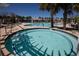 Inviting community hot tub and pool with lush landscaping and a clubhouse at 126 Citrea Dr, Summerville, SC 29483