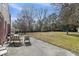 Expansive backyard with concrete patio and lush lawn, perfect for outdoor activities and relaxation at 1264 Fort Dr, Hanahan, SC 29410