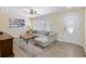 Bright and airy living room with hardwood floors and comfortable sectional sofa at 1264 Fort Dr, Hanahan, SC 29410