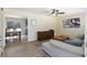Inviting living room featuring modern decor, a ceiling fan, and an open layout with light, vinyl floors at 1264 Fort Dr, Hanahan, SC 29410