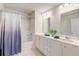 Bathroom with double sink vanity, white cabinets, tile flooring, and shower with tub at 131 Brant Dr, Summerville, SC 29483