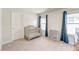 Cozy bedroom with crib, storage and blue curtains near large windows at 131 Brant Dr, Summerville, SC 29483