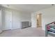 Bedroom features neutral carpet, a gray dresser and an ensuite bathroom at 131 Brant Dr, Summerville, SC 29483