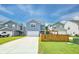 Lovely home with a long driveway, a garage, and a backyard with a playset at 131 Brant Dr, Summerville, SC 29483