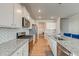 Modern kitchen featuring stainless appliances, granite countertops, and white cabinets at 131 Brant Dr, Summerville, SC 29483