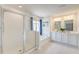Elegant main bathroom showcasing a walk-in shower, soaking tub, and double vanity with bright natural light at 131 Brant Dr, Summerville, SC 29483
