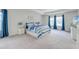 Serene main bedroom with tray ceiling, blue accents, and plush carpet for a relaxing retreat at 131 Brant Dr, Summerville, SC 29483