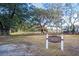Ponds Treehouse and Playground is surrounded by mature trees and a white fence at 131 Brant Dr, Summerville, SC 29483