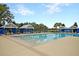 Gorgeous community pool surrounded by shaded seating areas and ample lounge chairs at 131 Brant Dr, Summerville, SC 29483