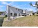 Spacious backyard with a patio, grill, and gazebo perfect for outdoor entertaining and relaxation at 134 Country Oaks Ln, Wando, SC 29492