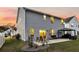 Cozy backyard featuring a patio with seating, a well-kept lawn, and relaxing ambiance at 134 Country Oaks Ln, Wando, SC 29492