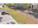 Expansive backyard with a patio, well-maintained lawn, and partial fencing for privacy at 134 Country Oaks Ln, Wando, SC 29492