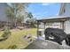 Outdoor backyard area features a patio with a gazebo and lush landscaping, ideal for outdoor cooking at 134 Country Oaks Ln, Wando, SC 29492