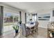 Bright dining area with sliding glass doors leading to the backyard at 134 Country Oaks Ln, Wando, SC 29492