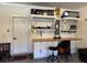 Organized garage features a workbench, ample storage, and neat tool organization at 134 Country Oaks Ln, Wando, SC 29492