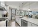 Modern kitchen featuring a large island, stainless steel appliances, and ample counter space at 134 Country Oaks Ln, Wando, SC 29492