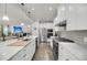 Spacious kitchen featuring stainless steel appliances, modern cabinetry, and a breakfast bar at 134 Country Oaks Ln, Wando, SC 29492