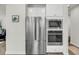 Modern kitchen with stainless steel refrigerator, microwave, and oven at 134 Country Oaks Ln, Wando, SC 29492