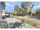 Outdoor patio with seating and a grill, perfect for entertaining and enjoying outdoor dining at 134 Country Oaks Ln, Wando, SC 29492