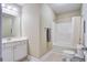 Bright bathroom with white cabinetry, vanity, and shower, offering a refreshing space at 1413 Basildon Rd, Mount Pleasant, SC 29466