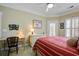 Cozy bedroom with desk, complemented by a comfortable bed and natural light at 1413 Basildon Rd, Mount Pleasant, SC 29466