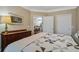 Comfortable bedroom featuring a bed with quilt, window with shutters and bedside table at 1413 Basildon Rd, Mount Pleasant, SC 29466