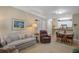 Relaxing living room and dining space with view to kitchen at 1413 Basildon Rd, Mount Pleasant, SC 29466