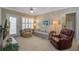 A cozy and furnished living room with a view outside at 1413 Basildon Rd, Mount Pleasant, SC 29466