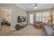 A bright living room with a view into the bedroom and access to the outdoors at 1413 Basildon Rd, Mount Pleasant, SC 29466