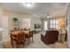 A beautiful furnished living room with multiple sitting spaces and a tv at 1413 Basildon Rd, Mount Pleasant, SC 29466