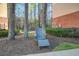 Outdoor patio space featuring chairs, complemented by wooded scenery at 1413 Basildon Rd, Mount Pleasant, SC 29466